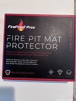 Front of box showing FireProof Pros branding, product name Fire Pit Mat Protector, key benefits including heat protection up to 1800°F, reflects 95% of heat, 6mm thickness, durable, and 3 layers.