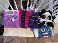Full lot of kids winter neck and face covers with critter hats