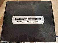 Box lid with Genesis Health Light branding.