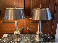 Front view of both lamps on a marble surface