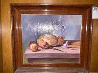 Framed full view from slight angle showing composition and frame