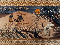 Close-up of central scene showing cranes beneath blossoming branches and full moon