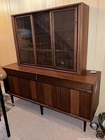 Front view of entire two-piece teak wall unit assembled