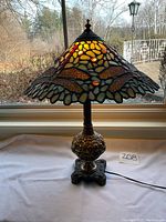 Front view of illuminated shade and full lamp