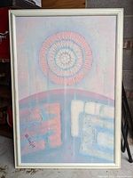 Full view of the large signed abstract painting on canvas with impasto texture and white frame.