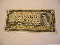 Front of the 1954 Canada twenty-dollar banknote with portrait of Queen Elizabeth II and serial number 3832583.