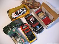 Grouped overview photo showing all seven diecast cars together.