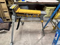 Full assembled Rockwell JawHorse with legs extended and clamp jaws open on workshop floor