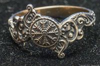 Close-up of the front face of the silver Viking ring with Vegvisir symbol and runic engravings