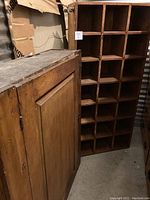 Both cubby unit and storage cabinet shown side by side