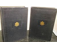 Front covers of Volume I and II showing titles embossed and gold seal of US presidential emblem.