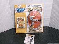 The original retail packaging of the Lou Gehrig 1993 Starting Lineup Cooperstown figure showing the figure in a batting pose, with included trading card pack attached to card backing.