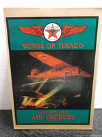 Box front with Wings of Texaco logo, airplane illustration and model info