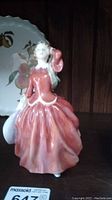 Front view of Royal Doulton Blithe Morning figurine showing detailed dress and pose.