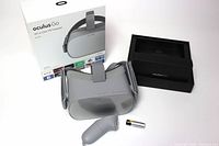 Oculus Go headset with box, controller, battery shown