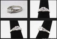 Four views of the sterling silver engagement ring with Asscher cut simulant diamond showing front, sides, and angled views on a black ring holder.