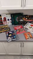 View of assorted illustrated children's educational and resource books arranged on a countertop.