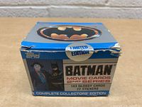 Photo of original collector's edition box for Batman Movie Cards 2nd Series by Topps, showing signs of wear, labeled as limited edition containing 143 glossy cards and 22 stickers.