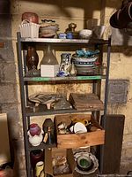 Full shelving unit loaded with assorted decor