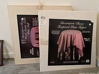 Photo of Decorators' Choice Tempered Glass Topper for a 24-inch wood accent table, sealed in box with image of table and glass topper on front.