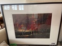 Framed acrylic landscape painting with abstract impressionist style, matted in white with a dark wood frame, signed by Jeanette Labelle.