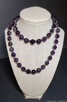 Full view of Coldwater Creek purple amethyst bead necklace displayed on bust showing faceted round beads and silver tone spacers.