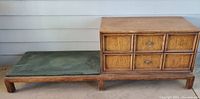 Full view of modular console showing pecan wood and green slate surface with two-drawer chest on left side.