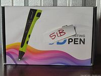 Front box view showing the image of the 3D printing pen and branding.