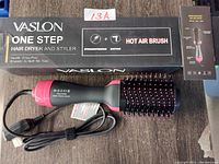 Vaslon One Step Hot Air Brush with box and product information card, showing the item and brand packaging.