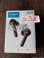 Front of retail box for Soundcore Life P2 black true wireless earbuds displaying 40-hour playtime and waterproof features.