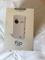 Front view of the Flip Video Ultra Series camera box displaying the product image and branding.