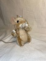 Full view of the plush Steiff mouse model 0148/19 sitting upright, showing beige and white fur, felt ears, black eyes, and tail.