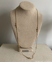 Full length 31 inch chain displayed on fabric bust