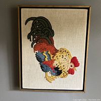 Full frontal image of framed crewel embroidery rooster artwork showing the entire piece.