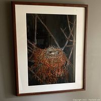 Full view of framed painting depicting bird's nest