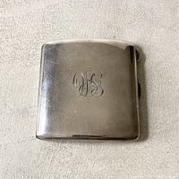 Front view of sterling silver case with engraved initials 'W S'