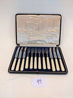 Complete boxed set of six knives and six forks in presentation case