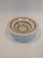 Front view showing the wide rim and circular pattern on the bowl