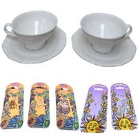 Two white Winterling Western Germany teacup and saucer sets with scalloped edges, paired with six carded necklaces (horse, owl, star, angel butterfly, sun and crosses) and one bumblebee pin.