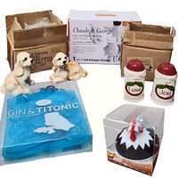 Display of all items in lot including dog salt and pepper shakers, ice cube tray, rooster timer, and boxed salt & pepper shakers sets.