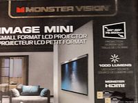 Front side of box showing product name Monster Vision Image Mini with details on screen size: 30"-80" and 1000 lumens brightness.