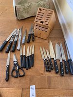 Overview of all knives and block laid out on floor