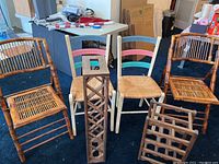 Full view of 4 chairs and 2 wooden wine racks showing all items in the set