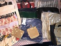 Lot of assorted totes varying in size, color, and fabric, mostly clean and good condition