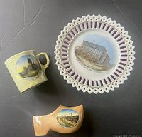 All three items together: yellow lustre cup, souvenir plate with King Edward Hotel, lustre ware shoe with Sunnyside Amusement Park.
