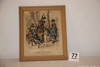 Framed lithograph showing full piece with visible frame and mounted on wall.