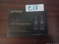 Photo of the product box with 'ammoon' branding showing a picture of the transmitter and receiver units and key features listed on the front.