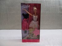Full boxed view of Barbie Ballet Star doll with visible outfit and box details.