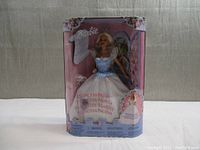 Front view of boxed Barbie Princess Bride doll #28251 showing minor wear on the box and floral design.