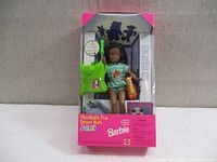 Boxed Flashlight Fun Barbie doll named Janet includes green backpack and Tigger figurine